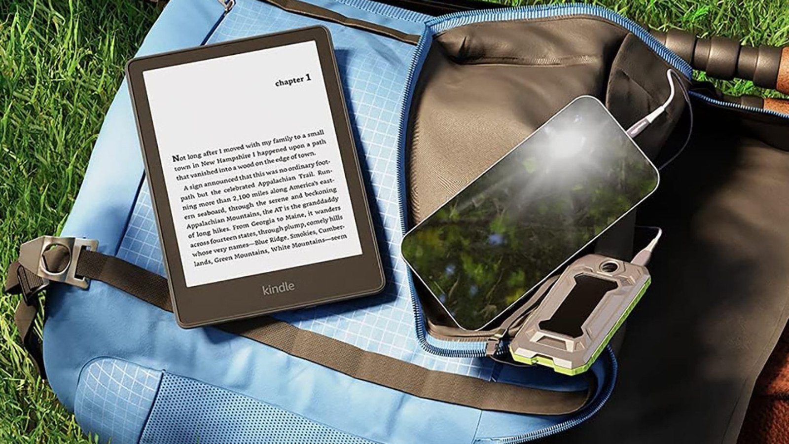 Kindle Paperwhite bên cạnh điện thoại